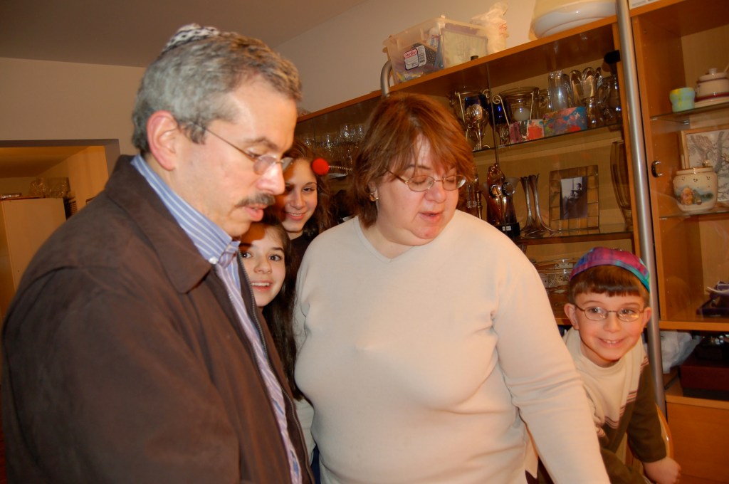 Cowans lighting Chanukkah Candles at SchwartzCentral 2005
